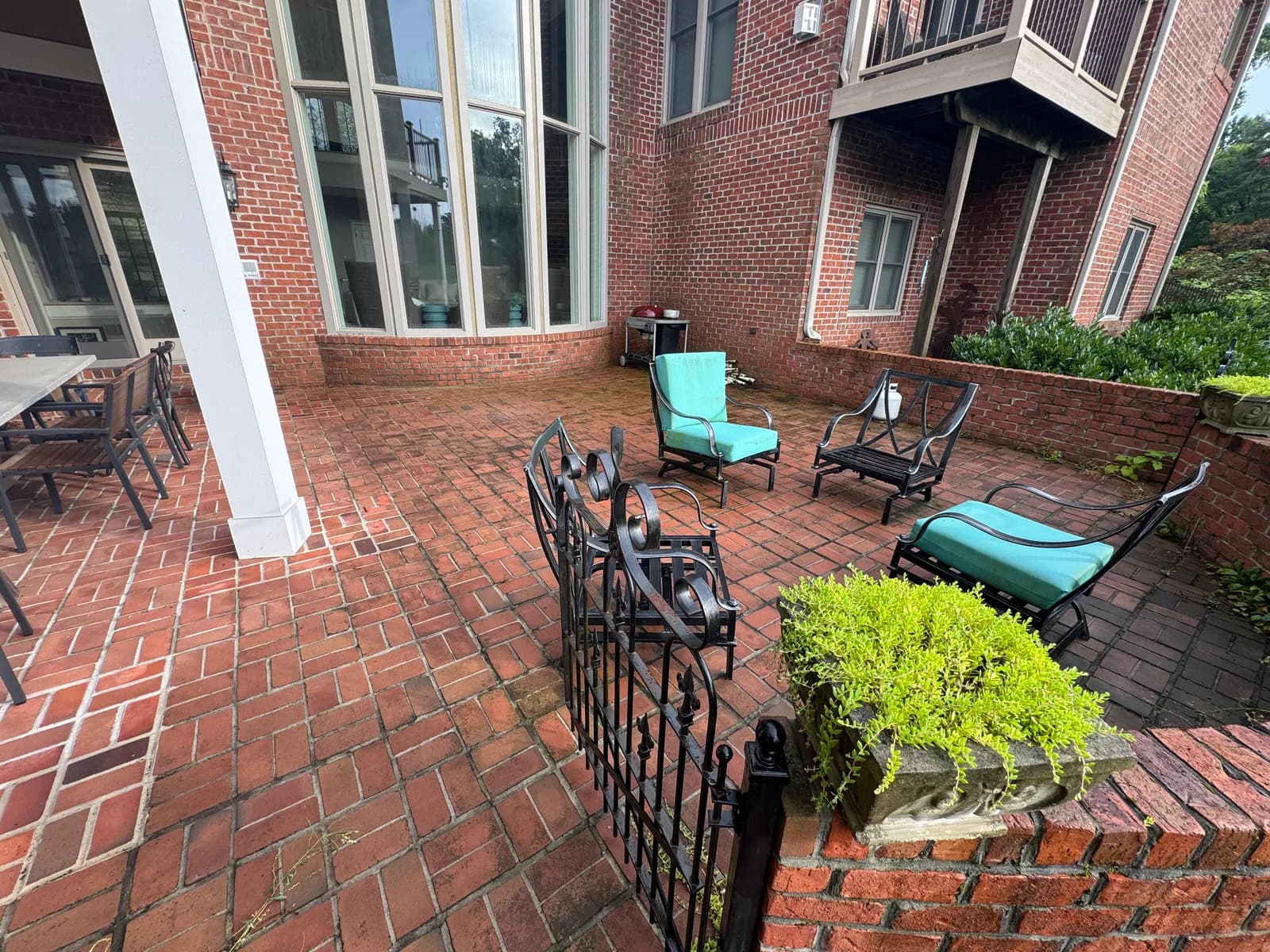 Brick patio before pressure washing